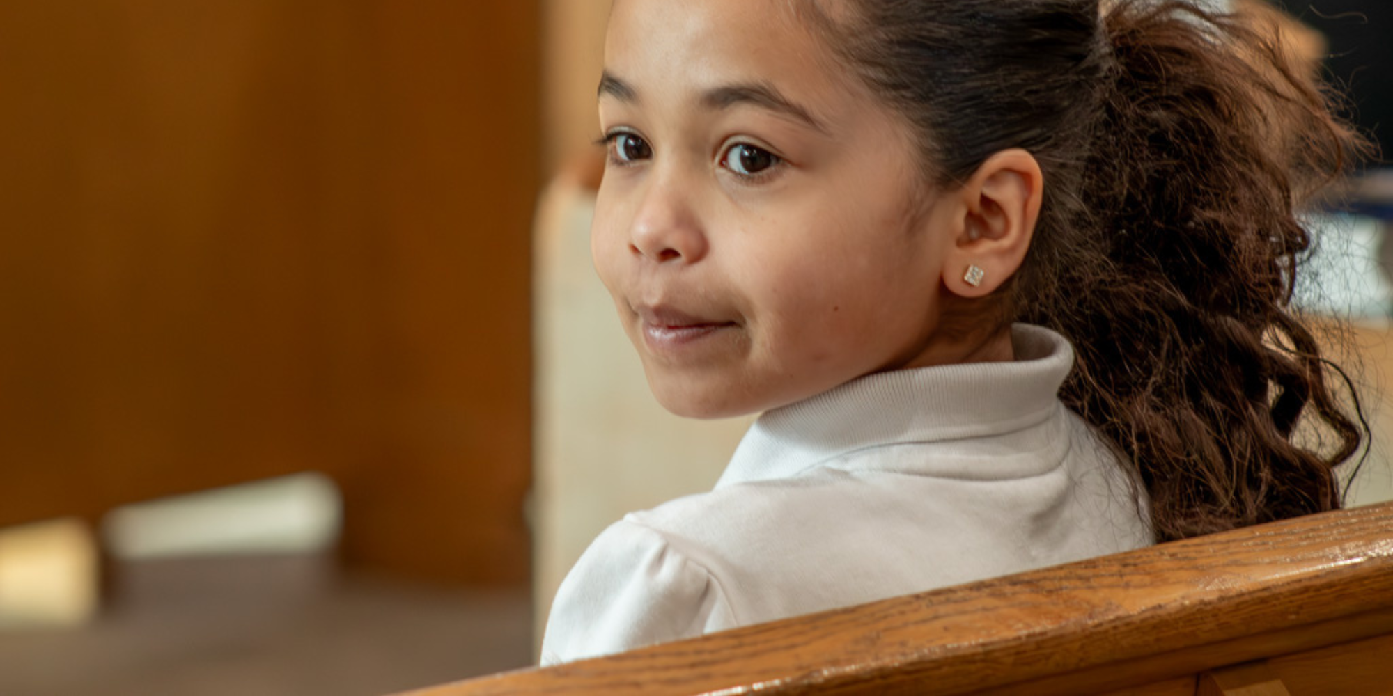 NDDP Student sitting at pew