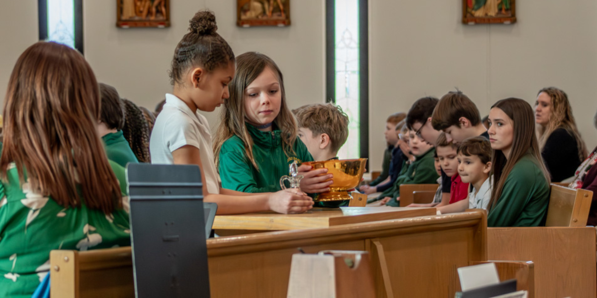 Notre Dame of De Pere Catholic School students in church
