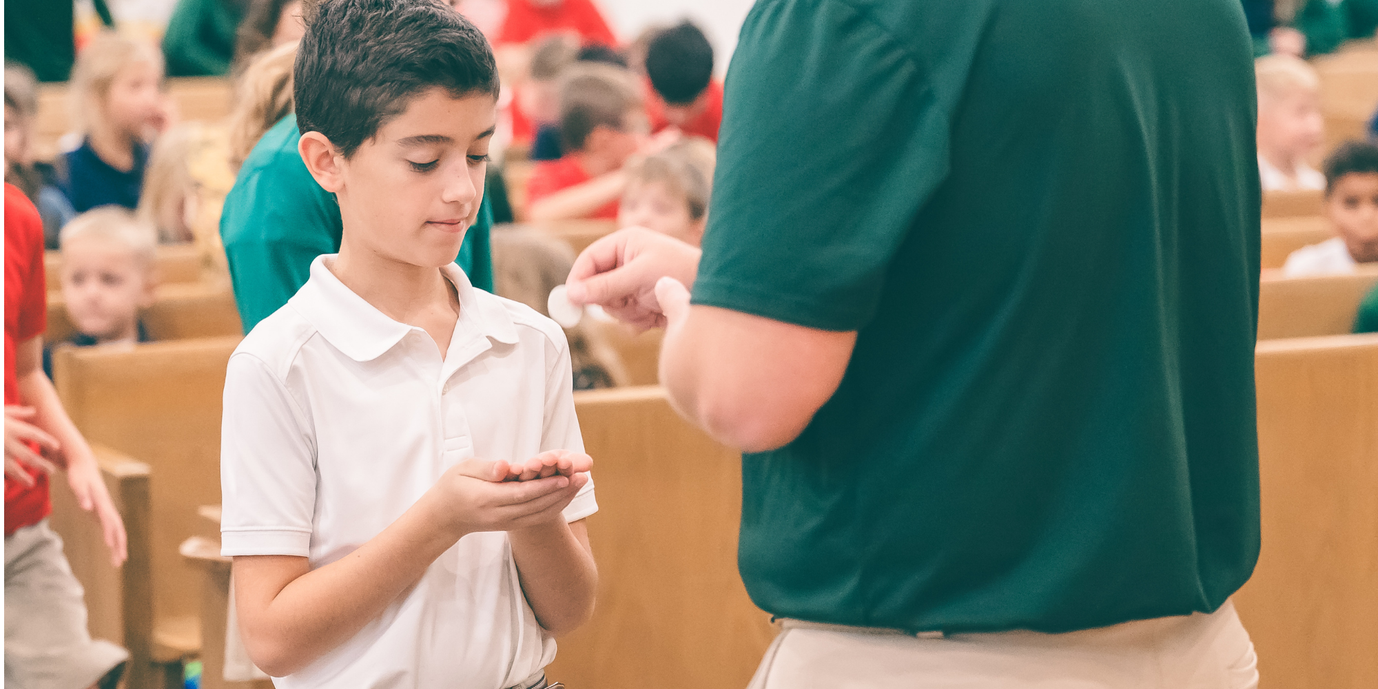 NDDP student receiving communion